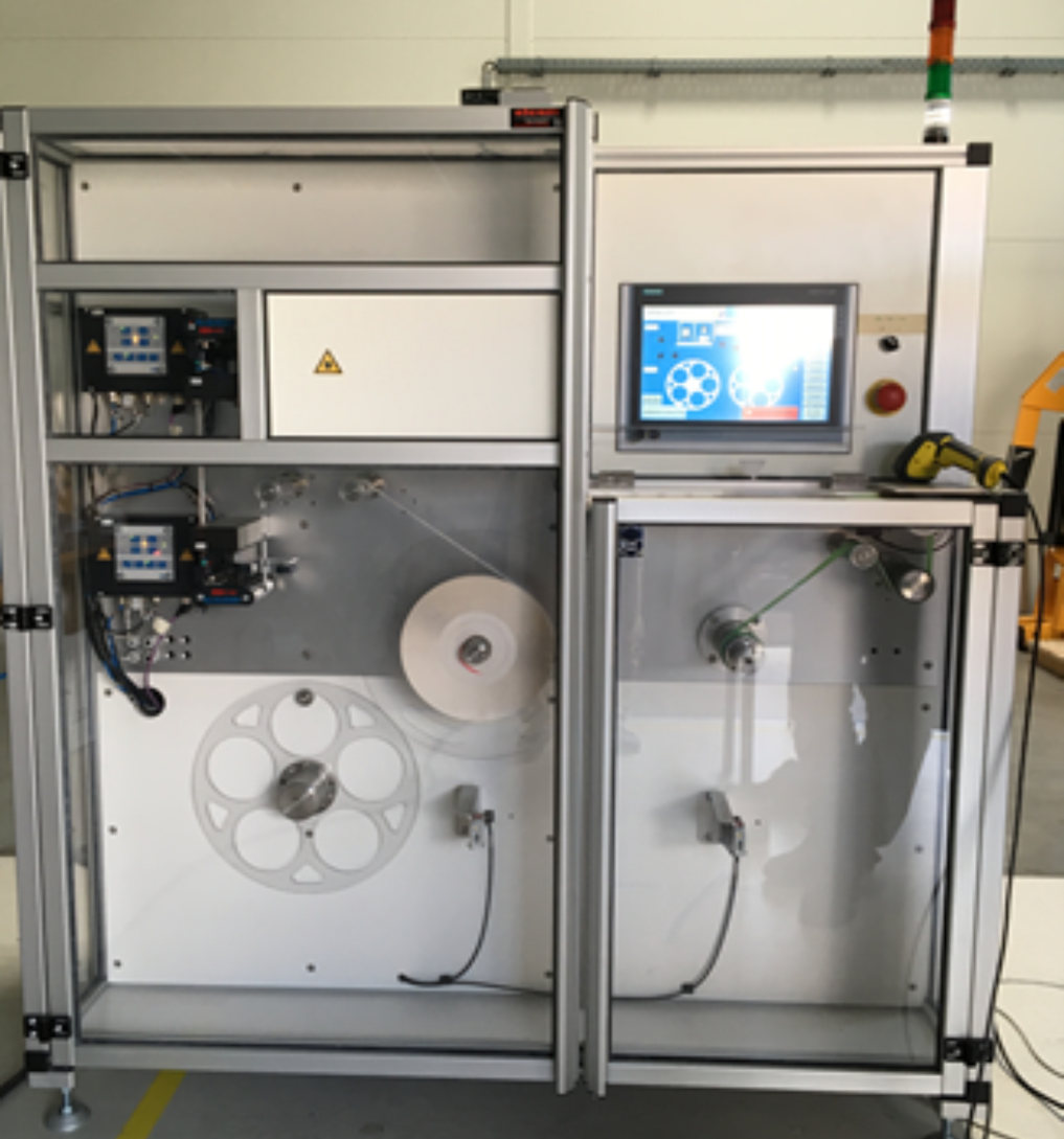 Intégration machines spéciale et outillage sur mesure pour l'industrie -Préparateur de bobines d'étiquettes en pharmacie